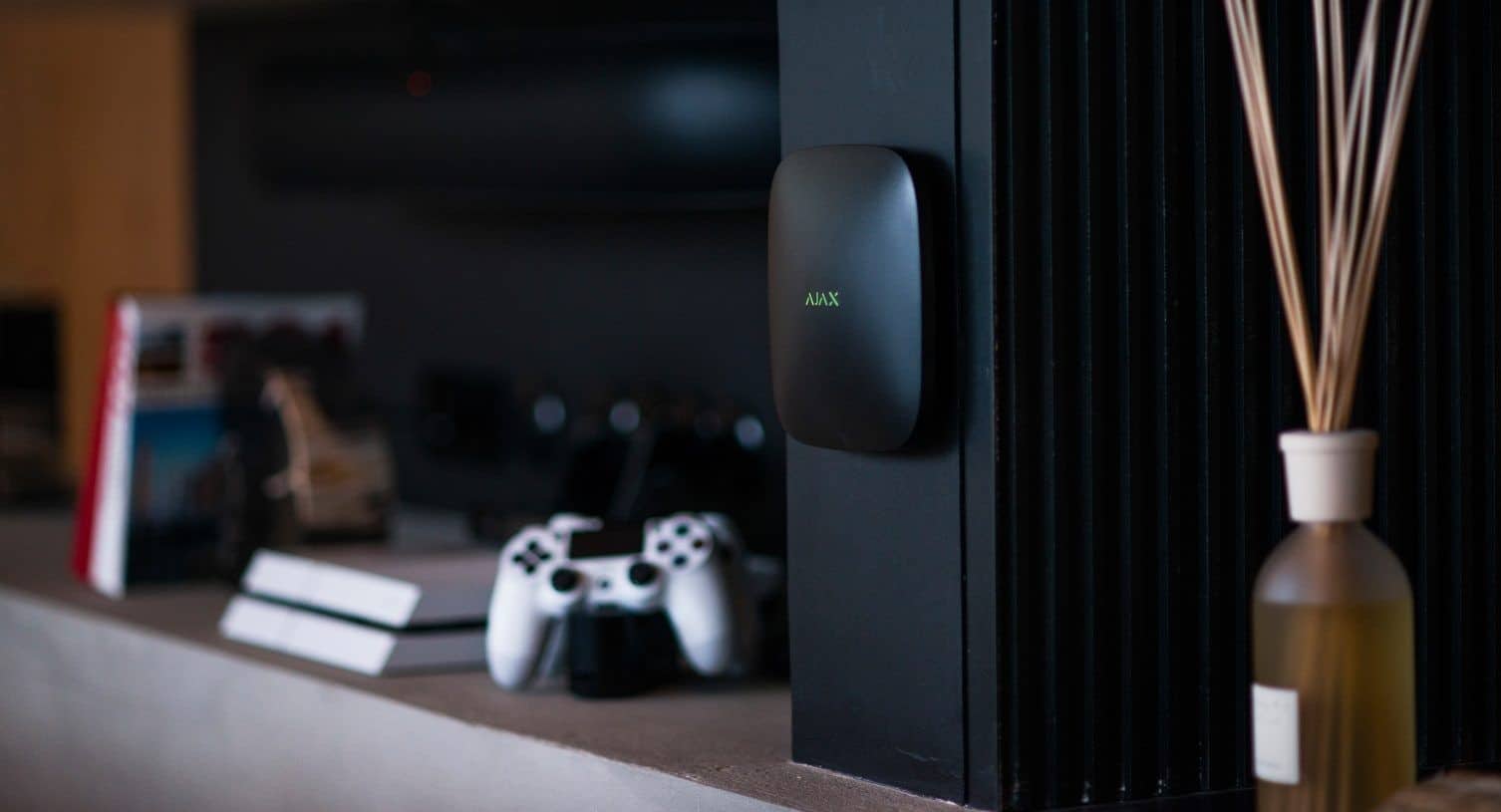 Ajax alarm hub installed in a living room